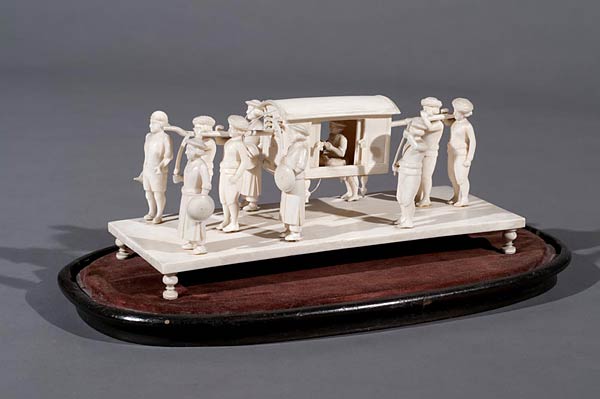 Man Carried by Attendants in a Palanquin, Murshidabad, or Lucknow, Ivory on an Ebony base, Early 19th century, 21.5 cms